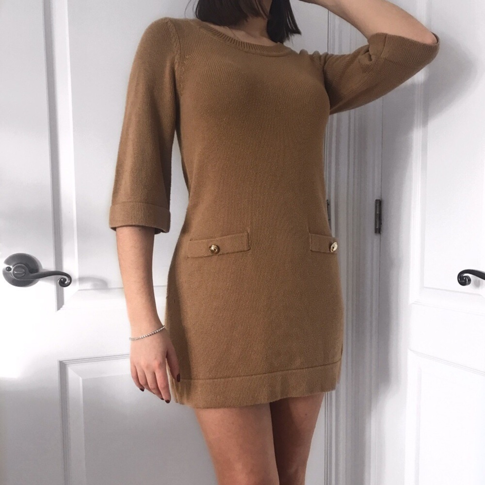 Beige dress with gold buttons on pockets